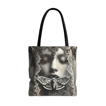 Tote bag featuring a veiled feminine face with intricate moth-wing detailing, displayed against a dark, moody forest background.